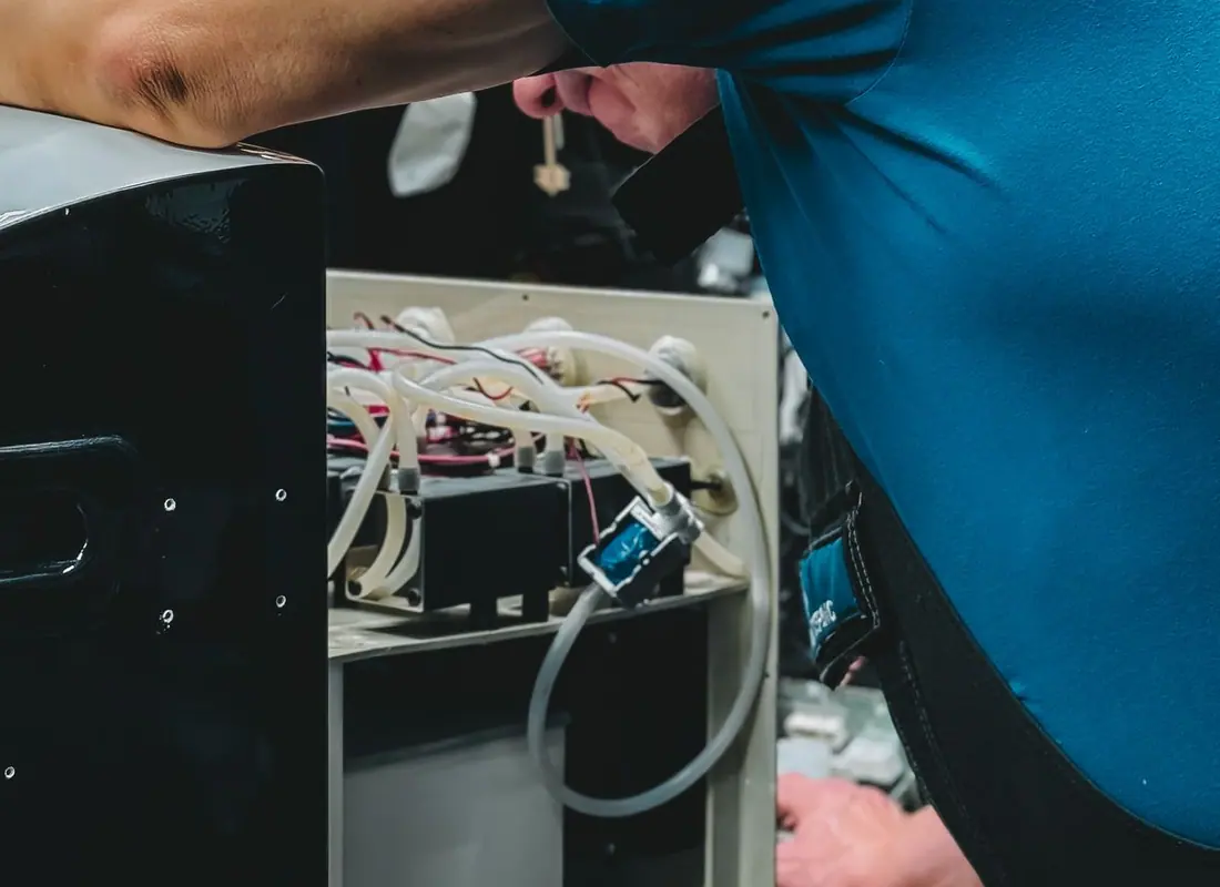Technician working on an appliance repair