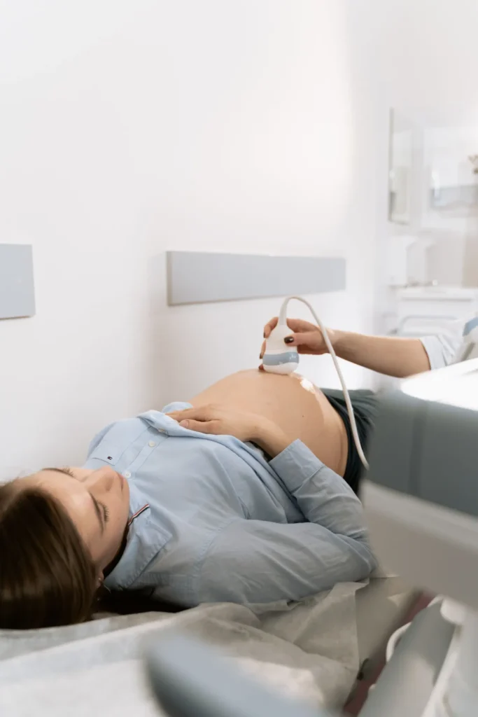Expecting mother relaxing during an ultrasound scan